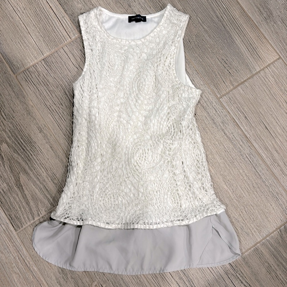 White sleeveless top